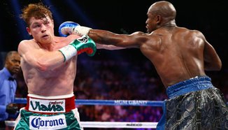 Floyd Mayweather Jr. победи Saul "Canelo" Alvarez по точки